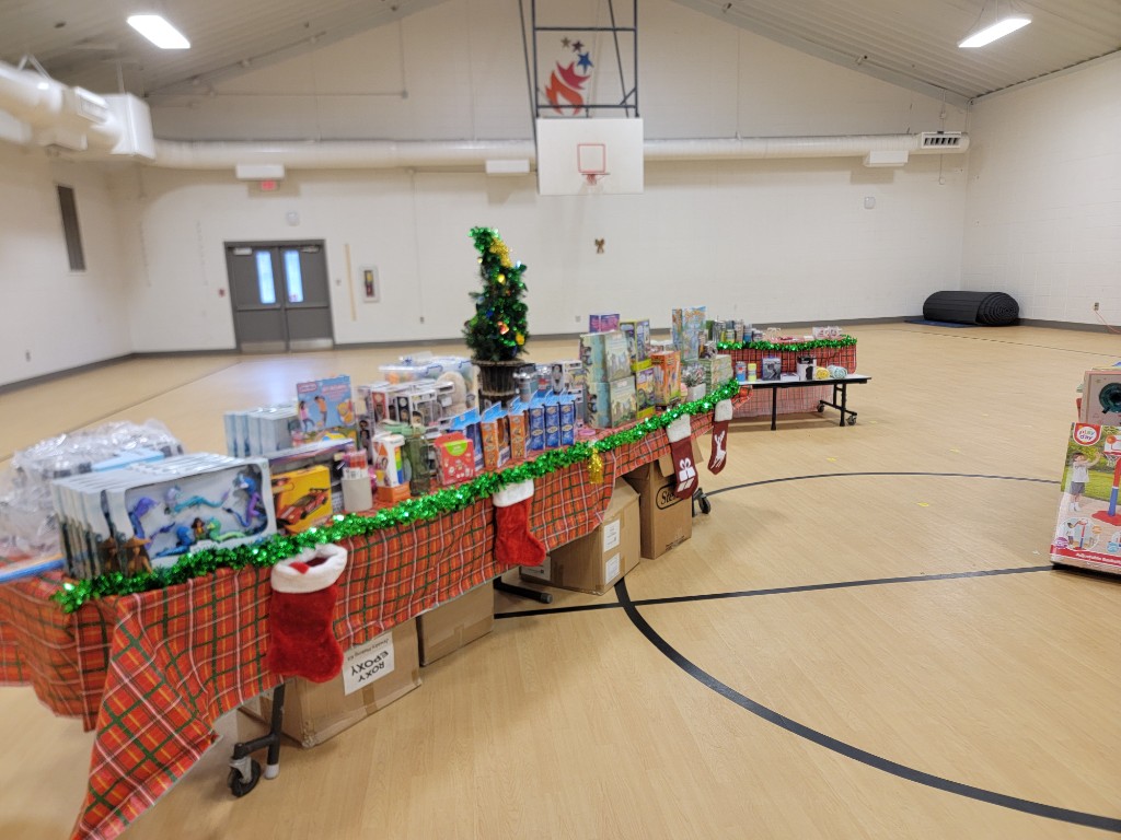 Festive tables with toys and Christmas decorations